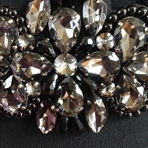 Black stretchy belt with beautiful buckle.